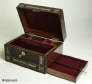 A rosewood veneered box, inlaid with mother of pearl  and white metal in a stylised pattern,  having a replacement velvet lined liftout tray and a separately locked side drawer circa 1840.  Enlarge Picture