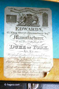 EDWARDS: 21 King St. Holborn, also Bloomsbury , and for one year, 1813-14 at 84 St. James Str. 1813-1848d. A formidable maker of luxury boxes. David Edwards, and Thomas Edwards (1832-39). The Family connection established through bills. Made for the Royal family. Used kingwood and rosewood extensively. Also mahogany for what he claimed to be "patent travelling cases". Writing boxes and dressing boxes mostly in Regency styles. All Edwards boxes are of impeccable quality.  more: total style; restrained. quality Enlarge Picture