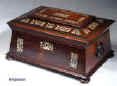 SB125: Antique  figured rosewood sewing box the top panel framed  inlaid with mother of pearl to the top and front having turned rosewood drop-ring handles and standing on  turned bun  feet. Inside the lid is lined with contrasting blue and cream silk and has a document wallet behind. The box has a liftout tray with supplementary lids covered in silk. Circa 1830. Enlarge Picture